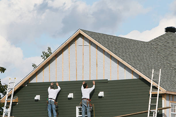 Professional Vinyl Siding technician working in Burton, OH